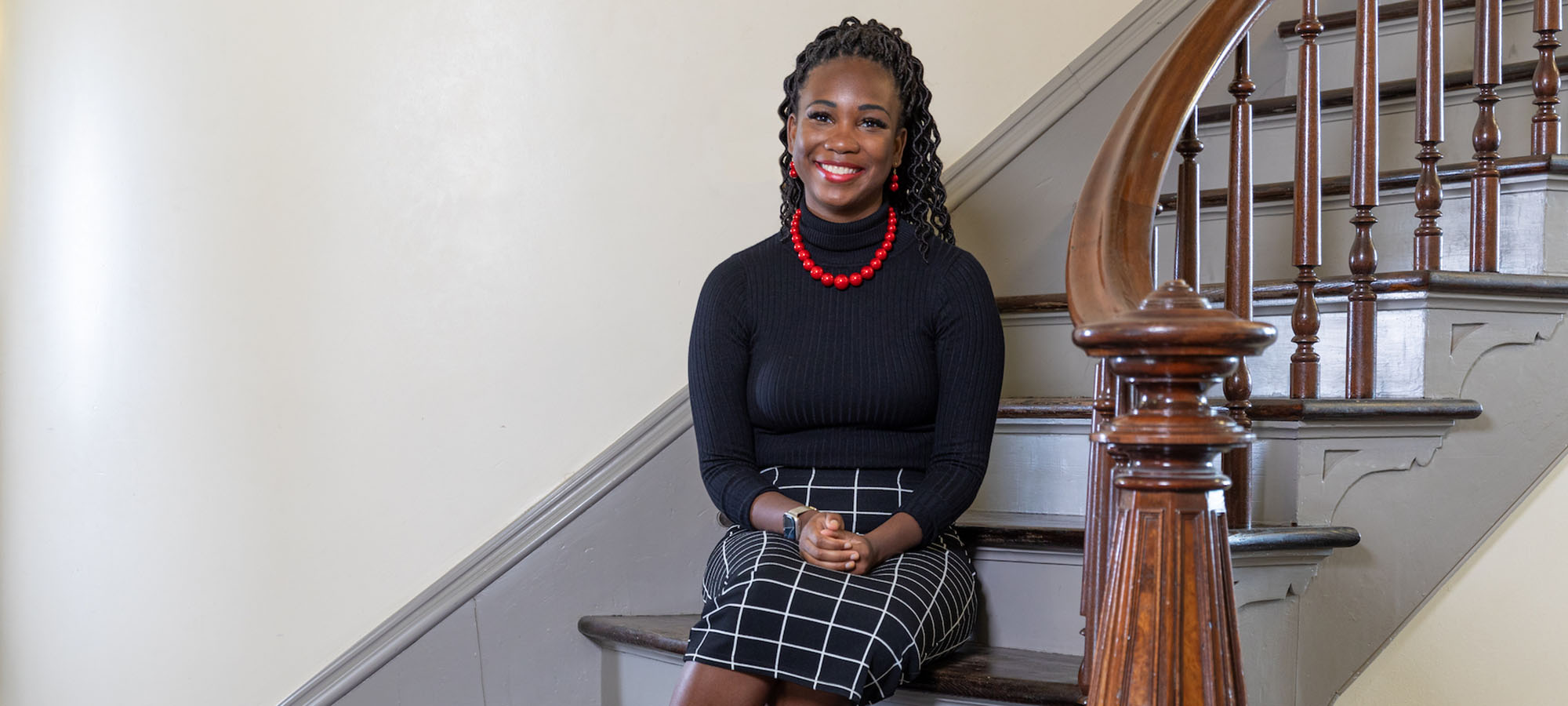 Ayana Gray, pictured here in Old Main, is the bestselling author of the “Beasts of Prey” trilogy and a 2015 alumna.