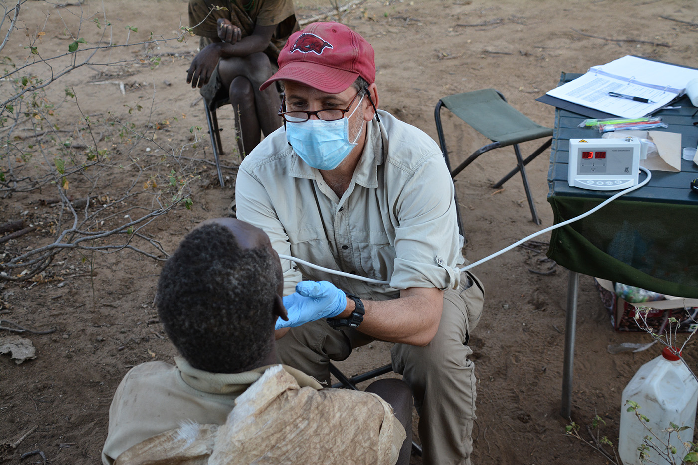 Ungar looks for cavities using LASER fluorescence on a Hazda hunter-gatherer in Tanzania.