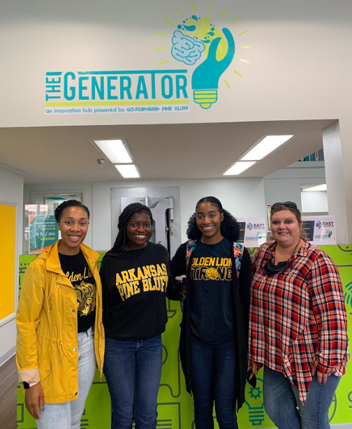 Tina Fletcher (far left) with tutors and a student at The Generator, a co-working space in downtown Pine Bluff.